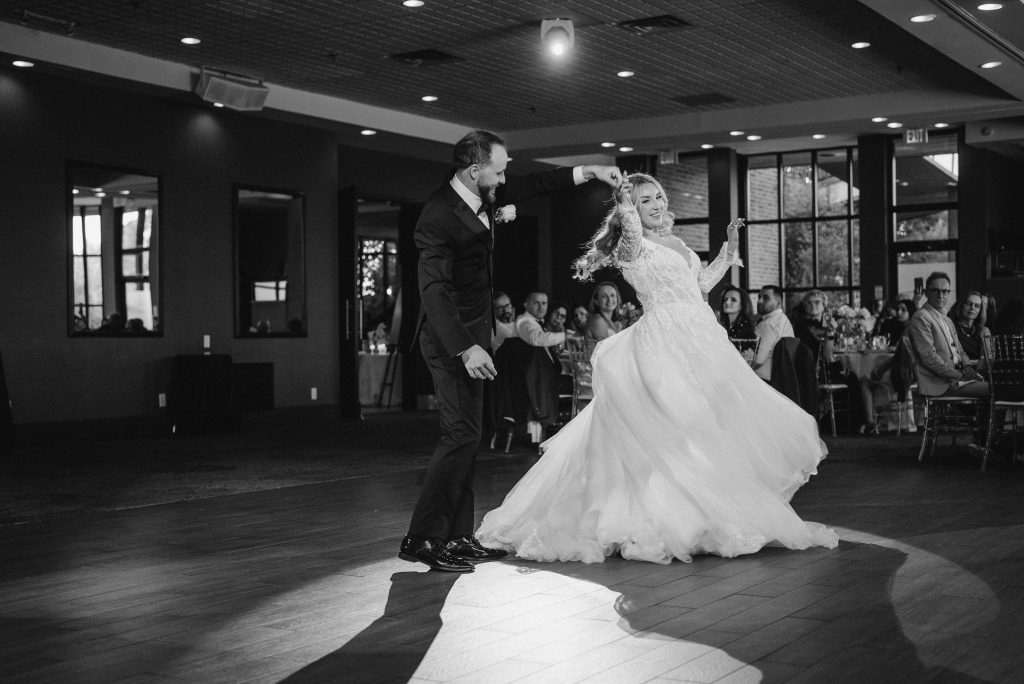 Bride and groom first dance in the reception hall at The Manor